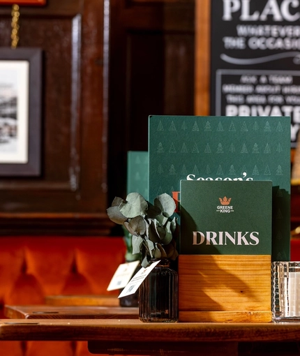 A close up of the Menu on the restaurant table at the Two Brewers.
