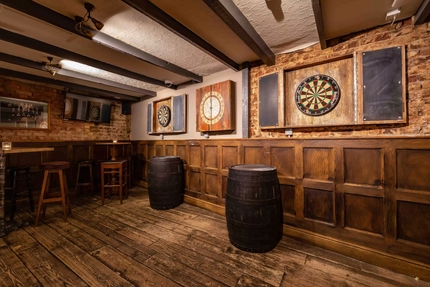 Some dart boards on the wall in Williams Ale and Cider House.