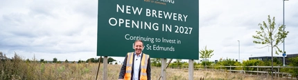 An image of Nick Mackenzie with a spade commencing the start of the new Brewery build in Bury St Edmonds.