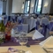 The decorated seating and dining area of the wedding event space at Windmill Farm.