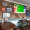 An interior shot of the restaurant, sport and seating area at the Waterside in Shoreham-By-Sea.