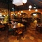 Interior dining area with tables and chairs.
