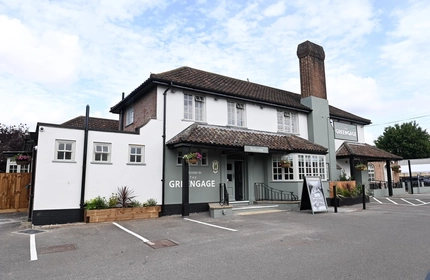 The exterior facade and car park at The Greengage.