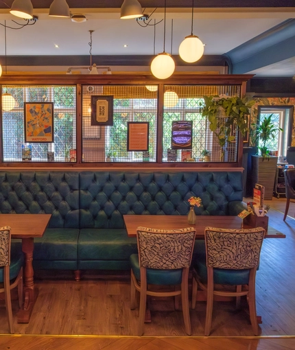 The interior restaurant and seating area at the Tudor Arms.