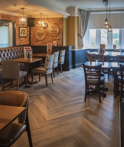 Interior dining area of a pub.