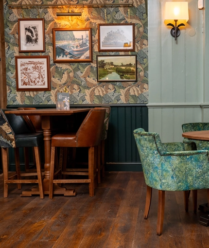 Some tables in the restaurant of the Wateringbury.
