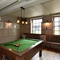 Pool table in interior games area of a pub restaurant