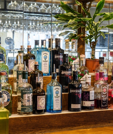 Spirits bottles behind bar