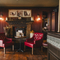 The interior restaurant and seating area with fireplace at the Three Tuns.