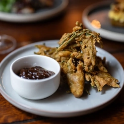 Samphire pakoras with a pot of date and tamarind chutney
