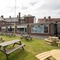 The exterior beer garden and seating area at the Black Horse.