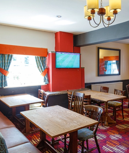 Interior dining area of a pub.