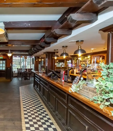interior seating area and bar of the pub