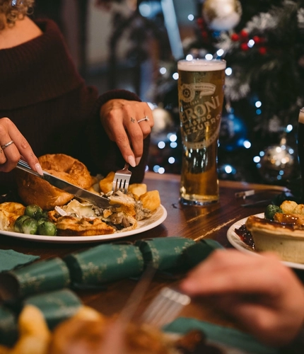 A plated meal on a festive decorated table.