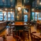 The interior bar and seating area of the Garrick Arms in Charing Cross.