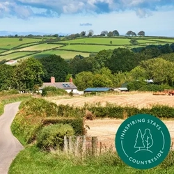 A banner promoting countryside stays at Greene King Inns. 