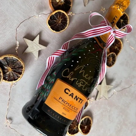 An image of a painted bottle of Prosecco advertising a Paint A Bottle Of Fizz What's On event at The Cart & Horses.