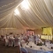 A marquee, decorated for a wedding.
