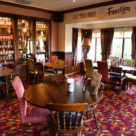 Interior dining area of a pub.