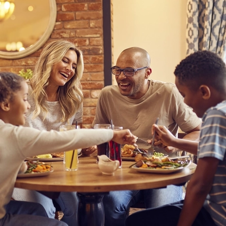 A family enjoying a meal together at a Hungry Horse pub