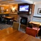 interior of the restaurant and seating area with TV
