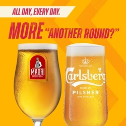 A banner featuring a pint of Madri & a pint of Carlsberg with the wording "All day, every day. More, Another round?" to advertise a promotion at Flaming Grill venues.