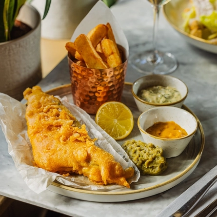 A fish & chips dish served at Crafted Venues.