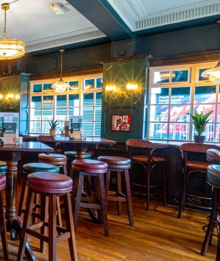 The interior restaurant and seating area with bar at the Fitzrovia.