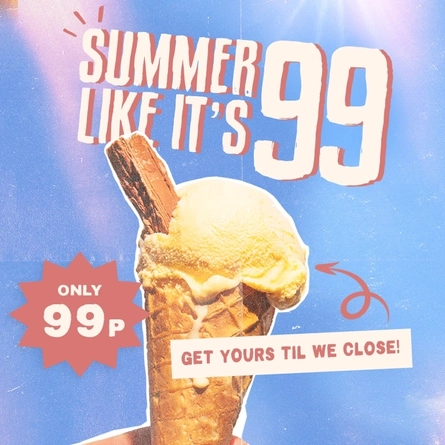 Ice cream served in a cone with a chocolate flake.