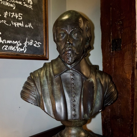 A statue head of Shakespeare inside the Dirty Duck.