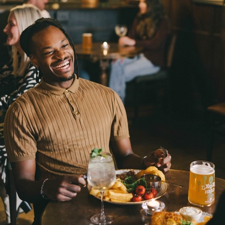 Couples enjoying a valentines meal at a Greene King Heritage vanue.