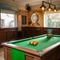 The interior pub gaming area at The Longship in Hebburn, with a dartboard and a pool table.