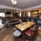 interior restaurant and seating area with bar