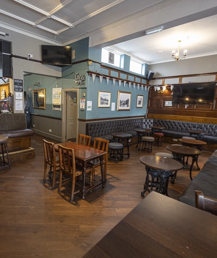 Interior shot of the seating area and TVs