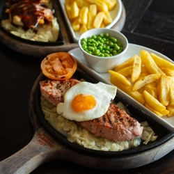 A close up of a breakfast from the new Spring/Summer menu at Flaming Grill.