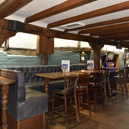 The interior restaurant seating area at The Old Punch Bowl.