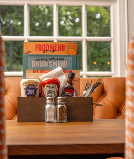 An image of one of the tables within the interior restaurant seating area at The Old Red Lion.