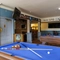 Interior shot of the pool tables and seating area
