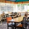 The interior restaurant and seating area with TV at the Pack Horse.