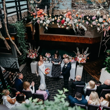 An interior shot of a Wedding taking place in the Conservatory/event area at the Ubiquitous Chip in Glasgow.