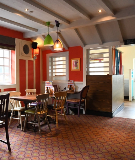 Interior dining area of a pub.