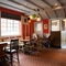 Interior dining area of a pub.