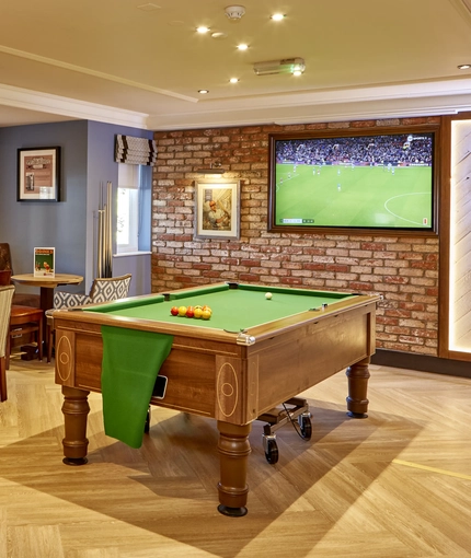 A pool table, dartboard and TV at the Snipe.