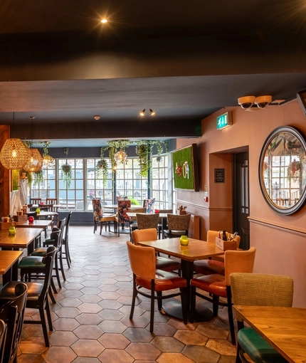 Interior dining area of a pub.