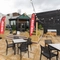 Part of the beer garden in front of the entrance of the Cocked Hat.