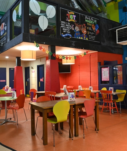 Interior play and dining area of a pub.