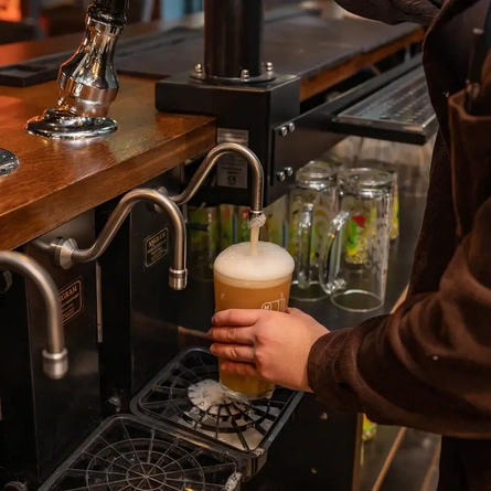 Metro - The Black Lion (West Hampstead) - Bartender pouring a pint