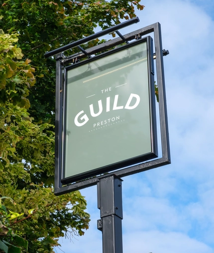 An image of the exterior venue signage at The Guild.