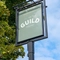 An image of the exterior venue signage at The Guild.