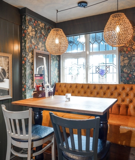 The restaurant area of the Woodman Inn.